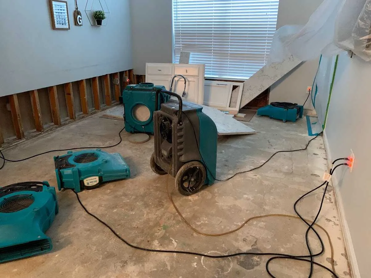 Dehumidifier in flood-cut room for Water Damage Restoration in Newberg
